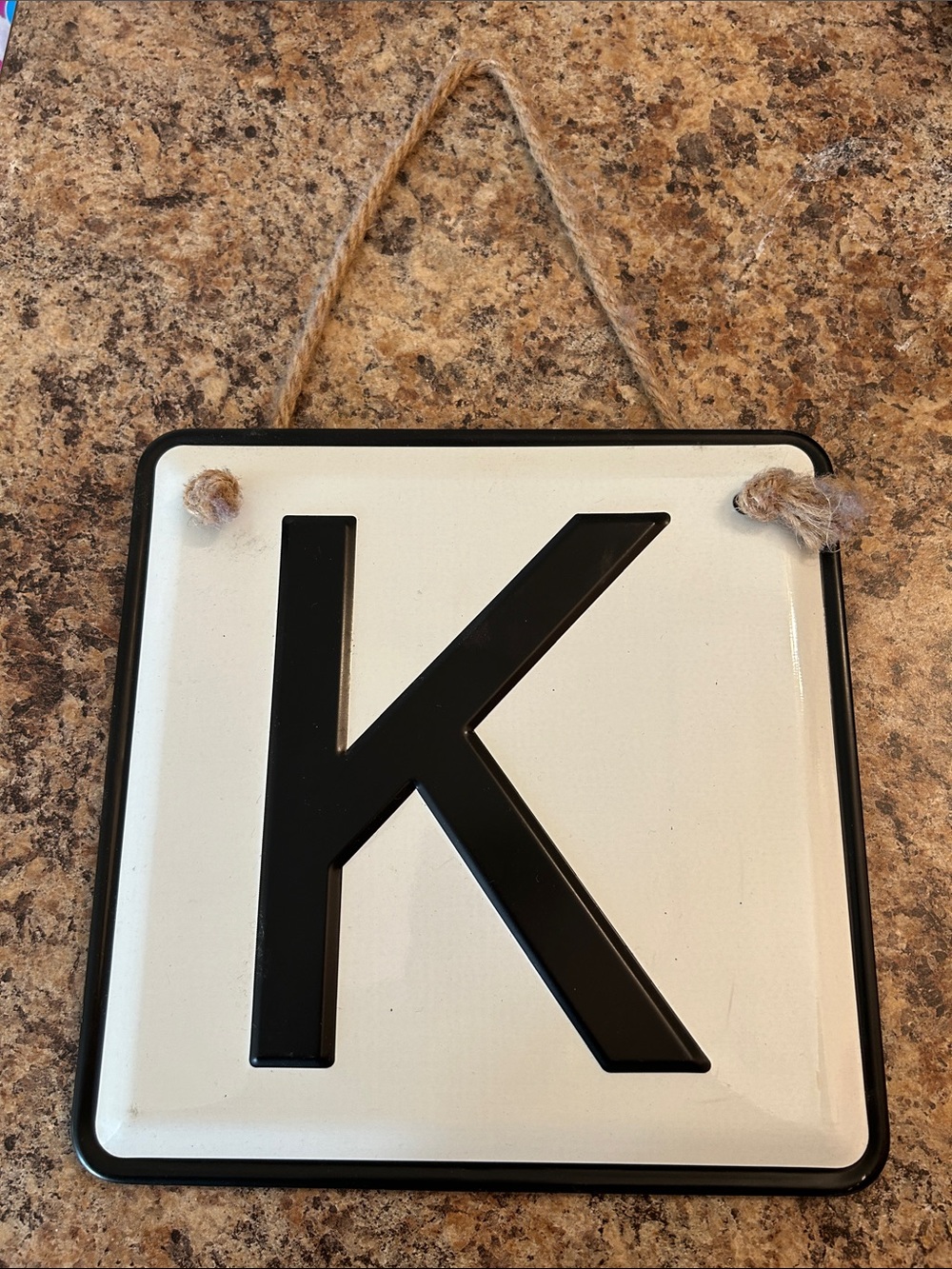 Black Letter K Hanging Sign - White Background